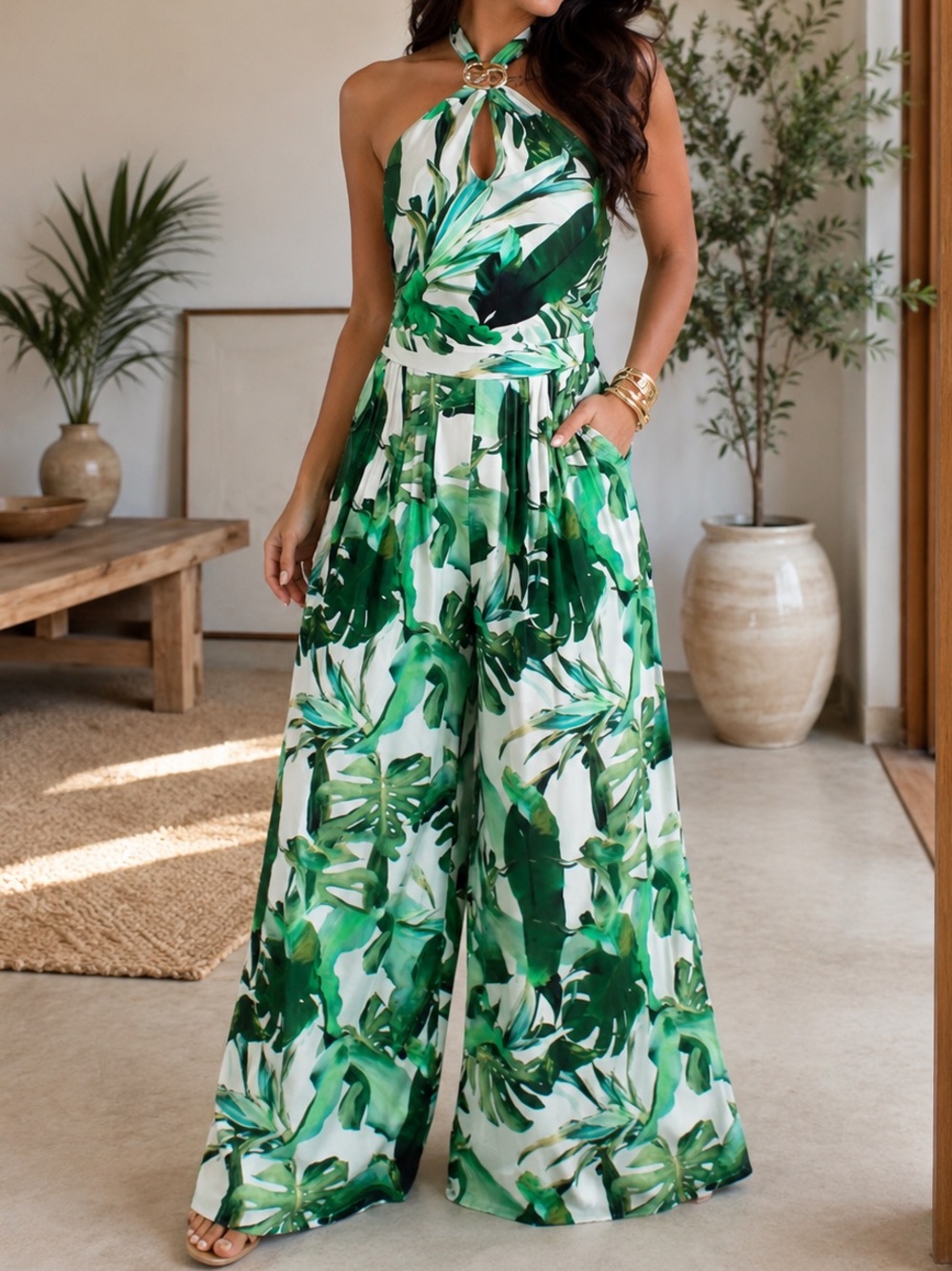 A. Peach Tropical Leaf Halter Wide Leg Jumpsuit with Pockets
